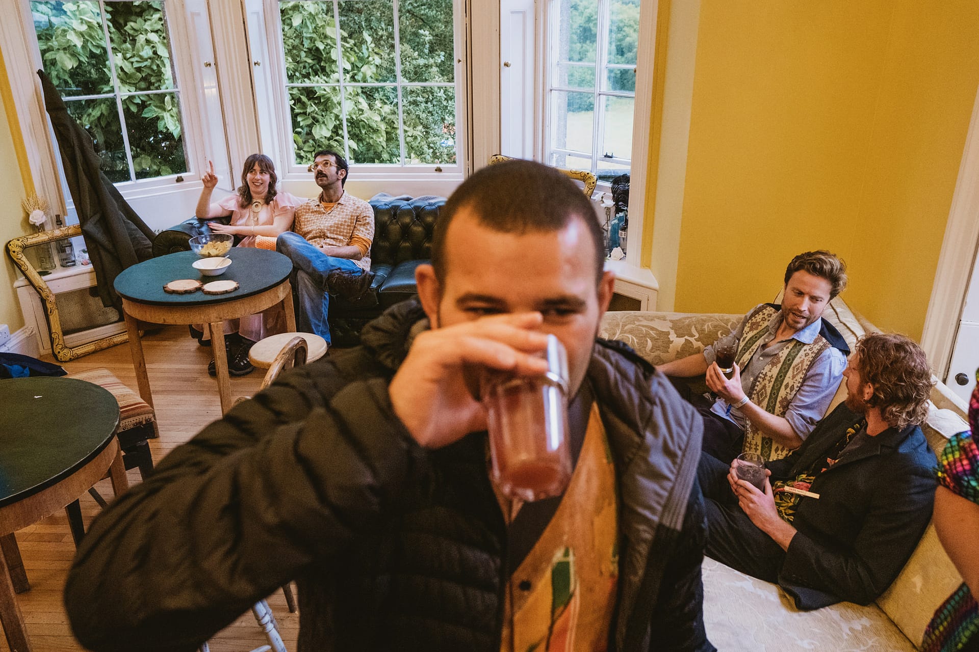 People socialising in a cosy living room