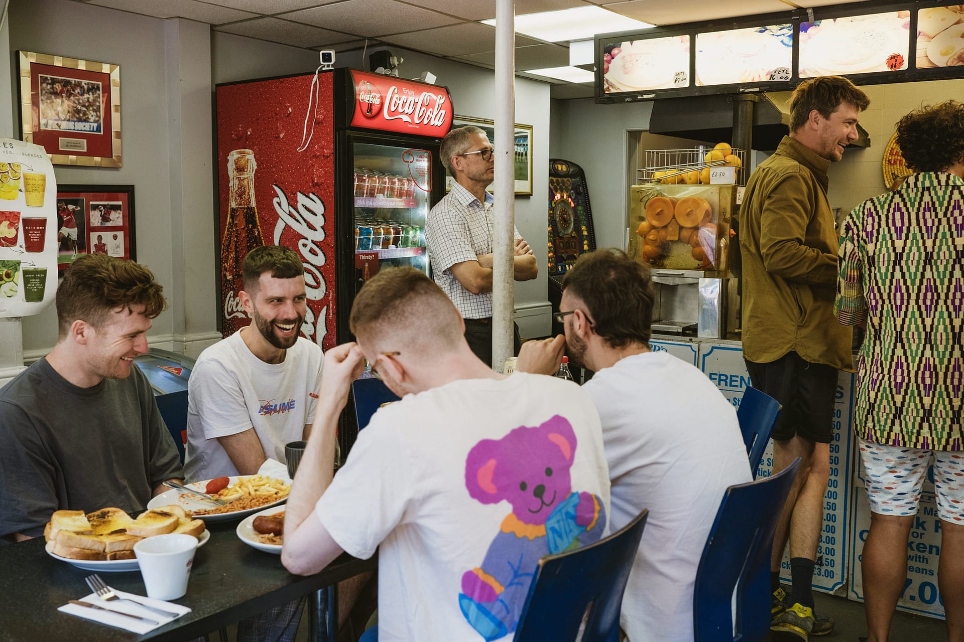 Friends enjoying a meal in a café.