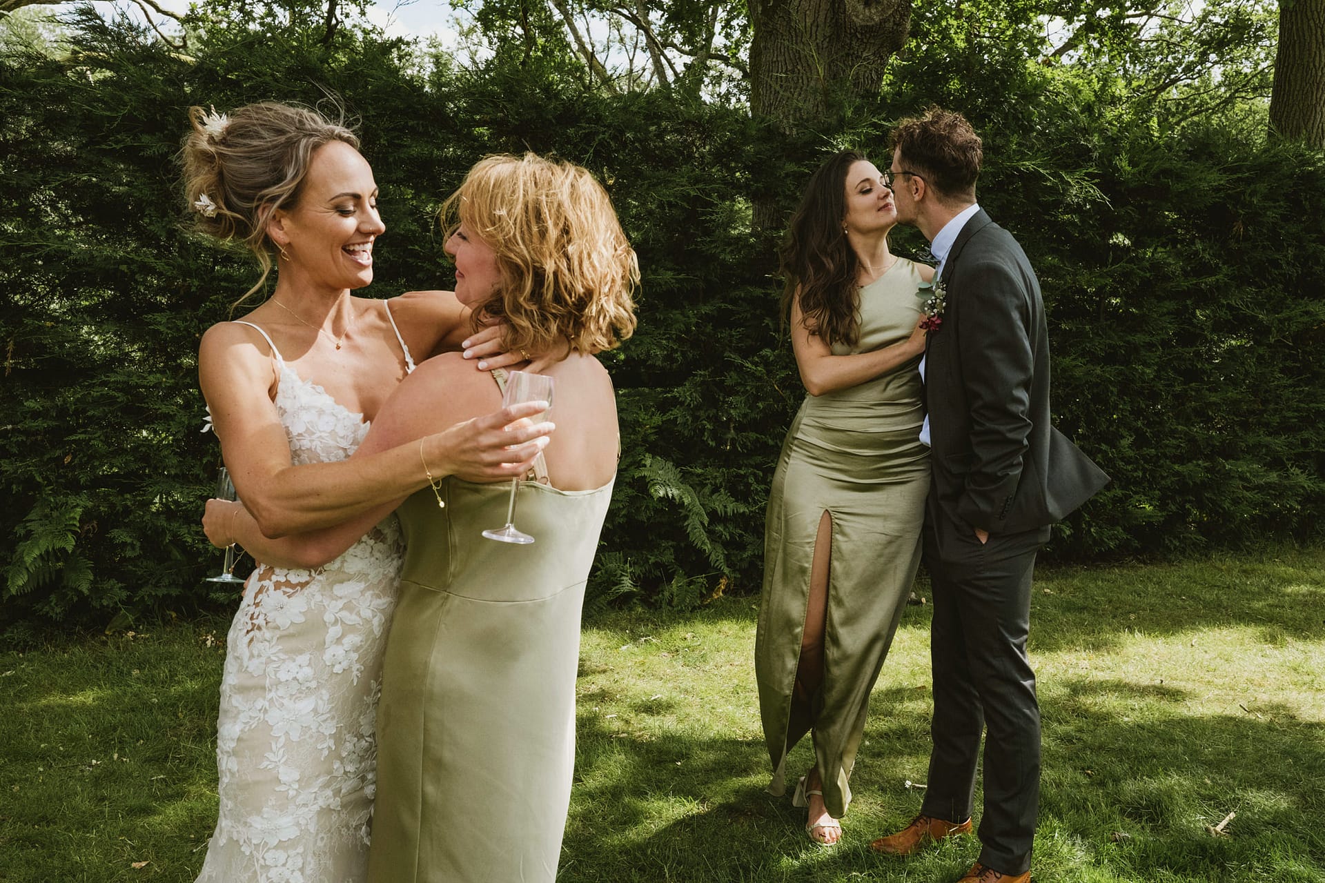 People celebrating at an outdoor wedding reception at Lythe Hill Hotel.