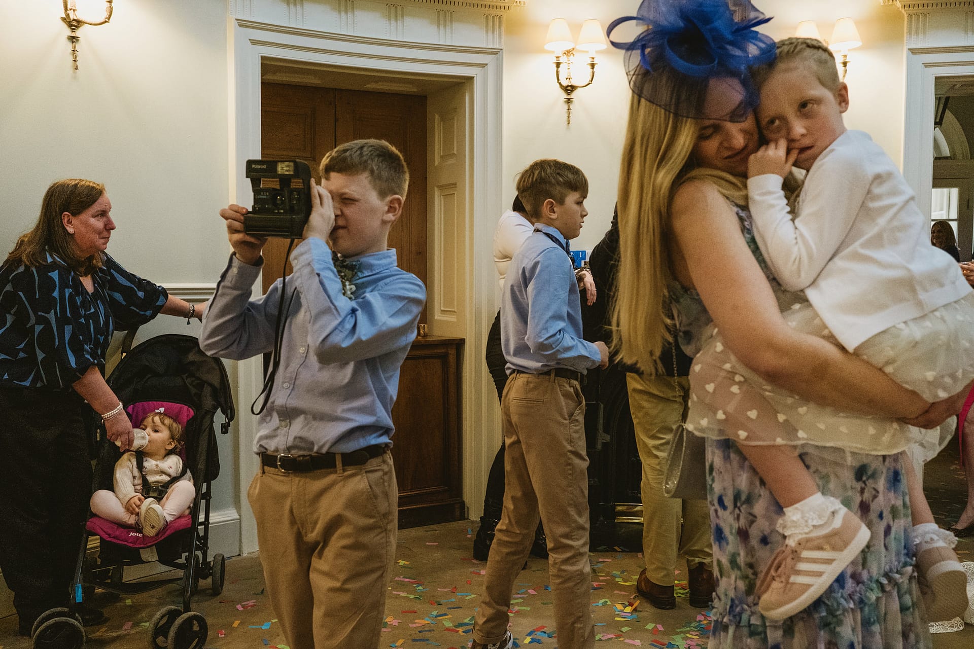 Children enjoying a family celebration indoors.