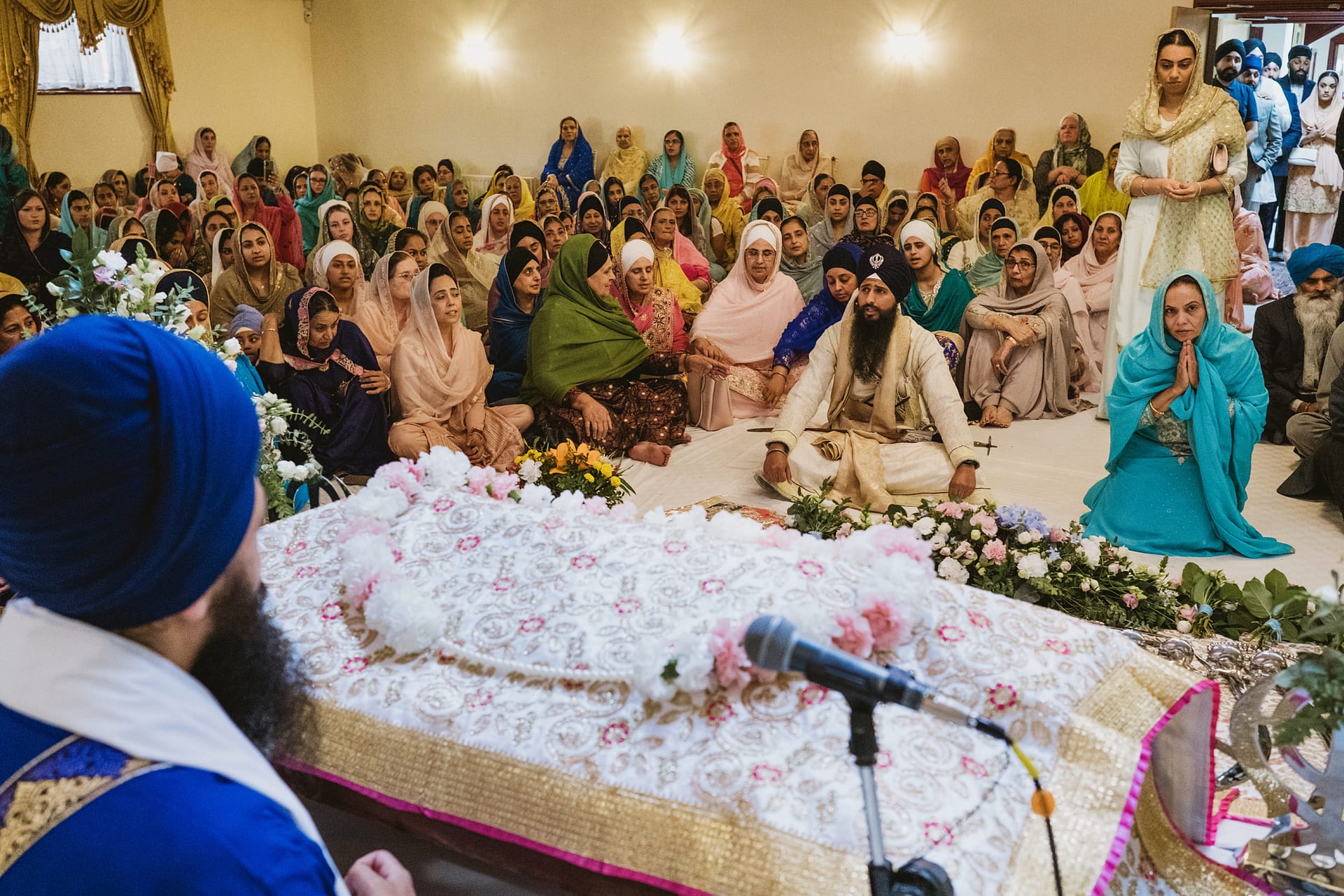Sikh congregation gathered for a religious ceremony