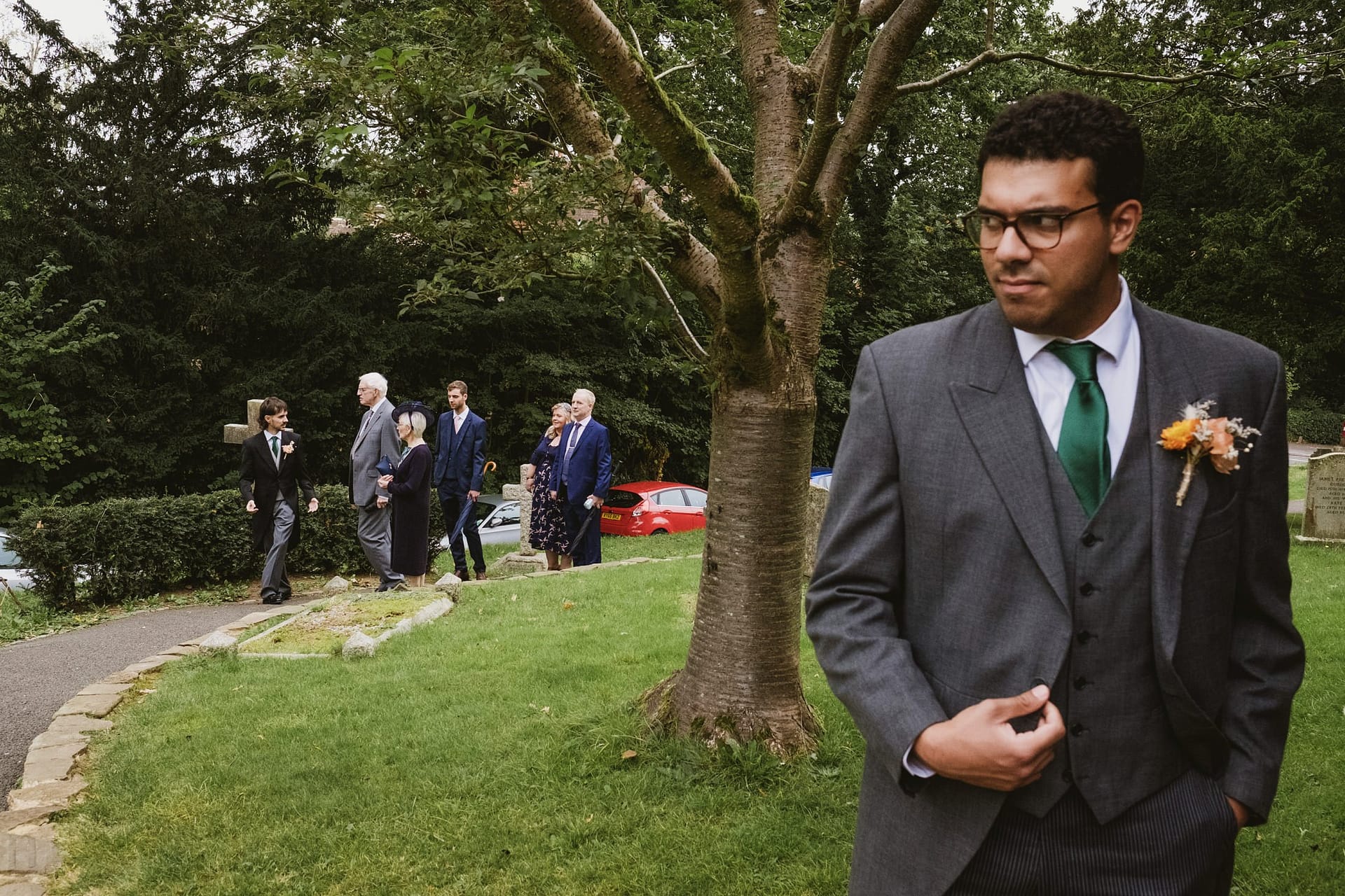 groomsmen waiting for guests to arrive