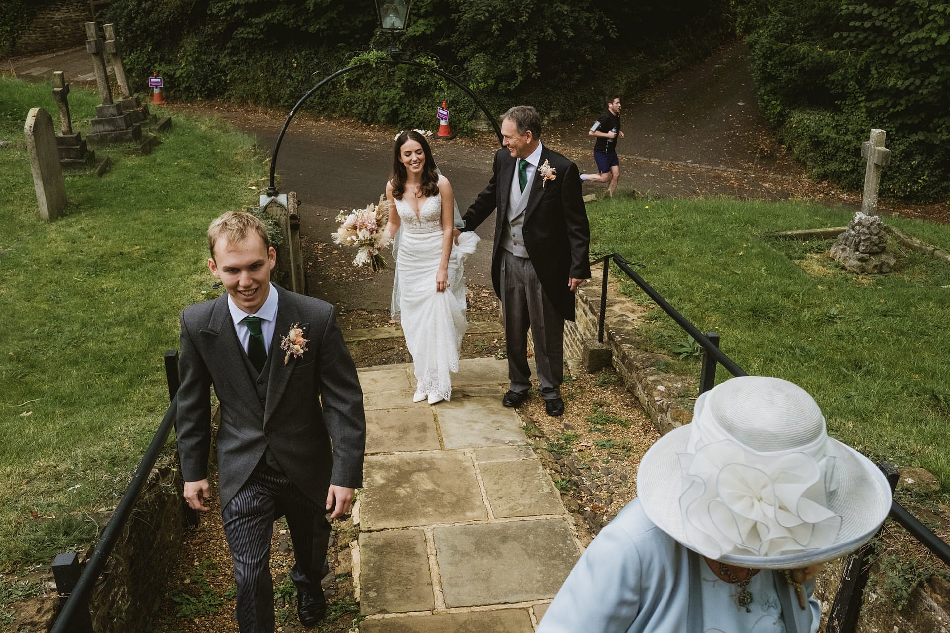 bride and father coming into the ceremony in Surrey