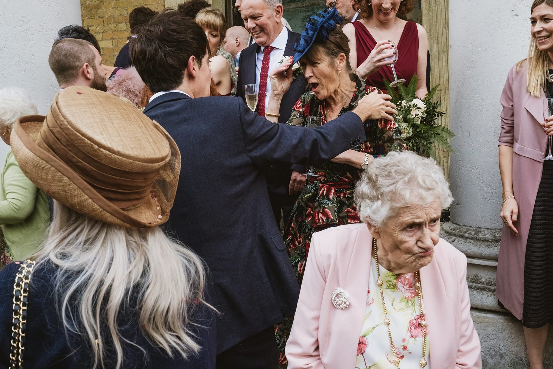 wedding guests outside the asylum chapel