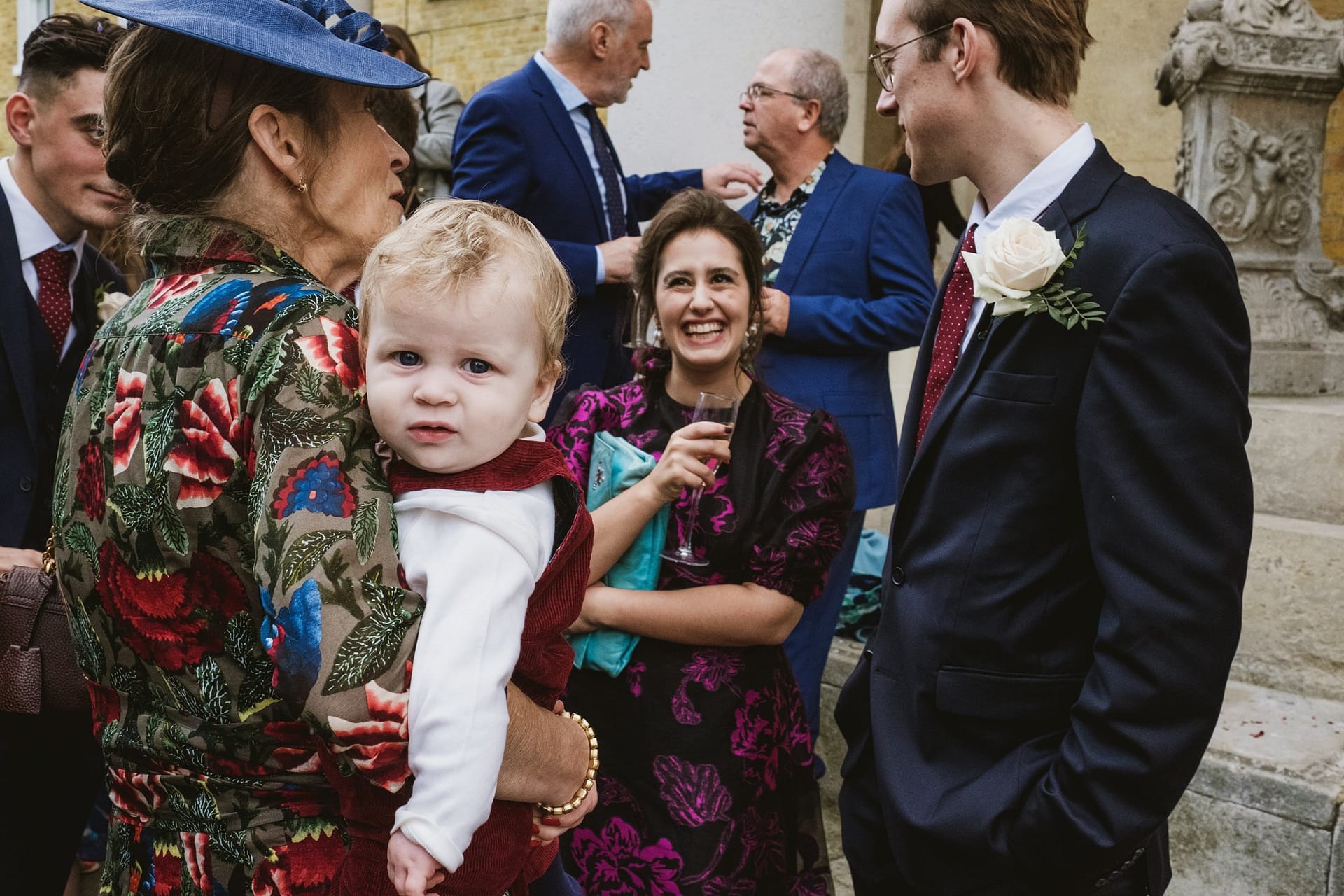 wedding guests outside the asylum chapel