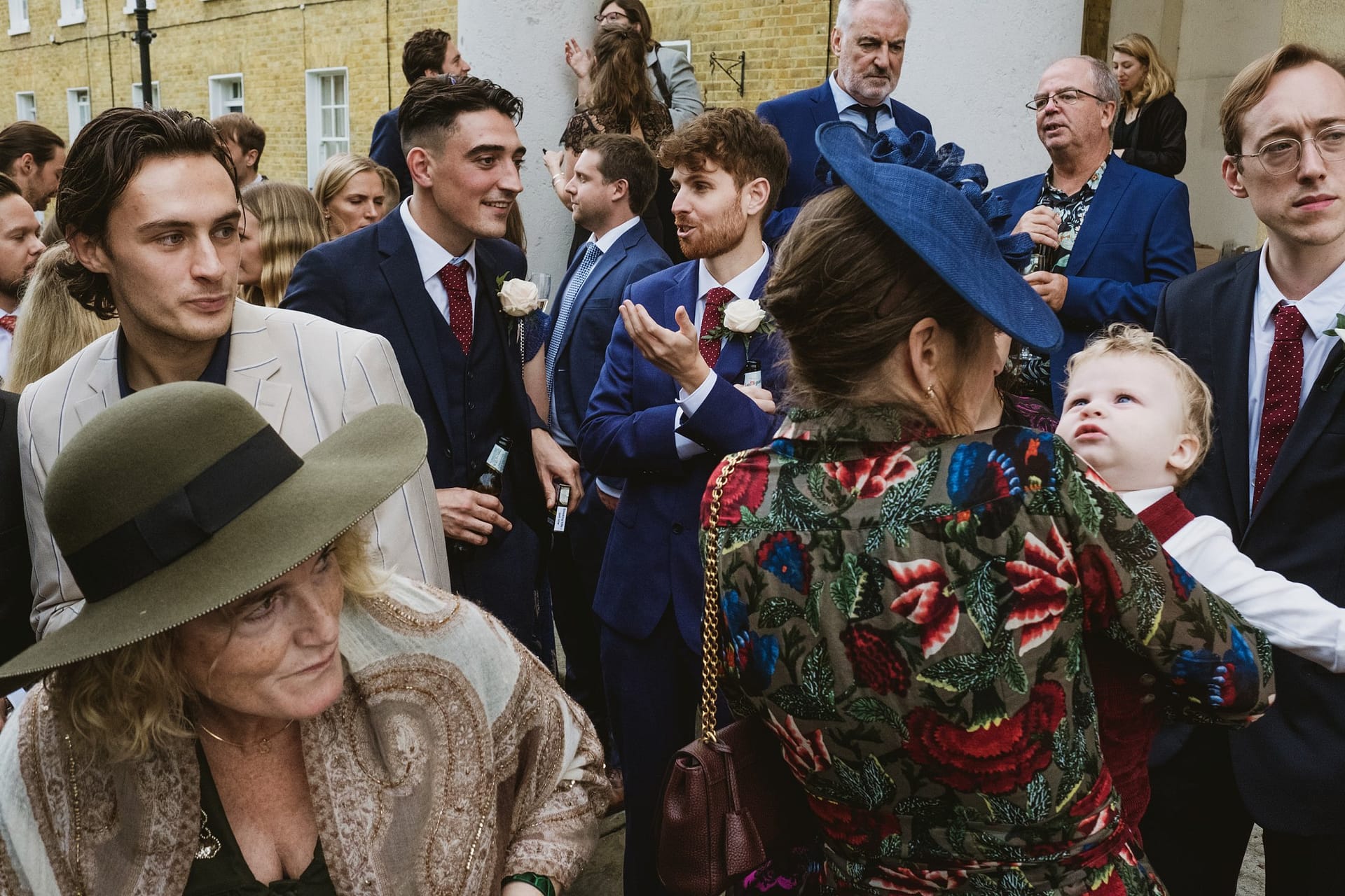 wedding guests outside the asylum chapel