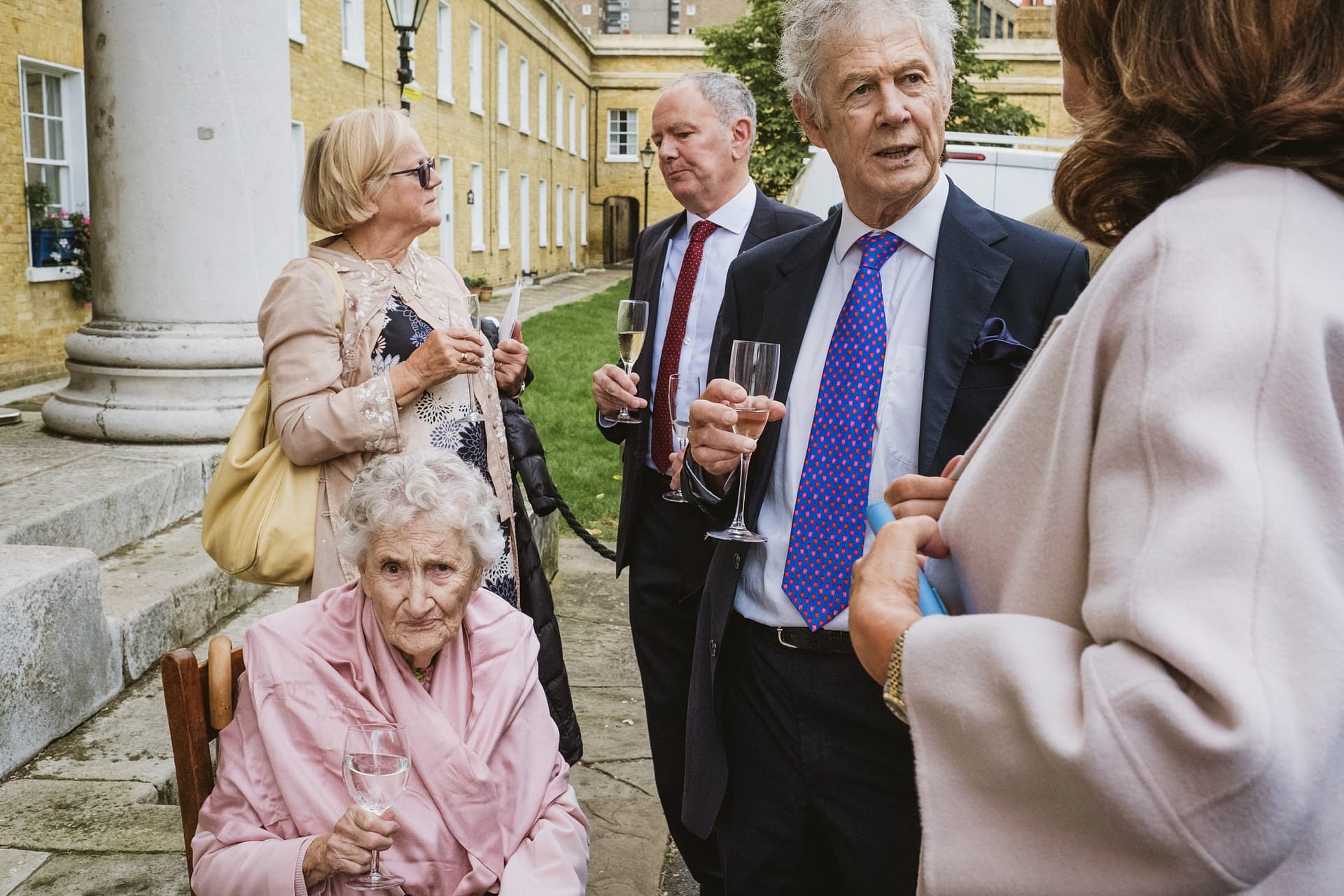 wedding guests outside the asylum chapel