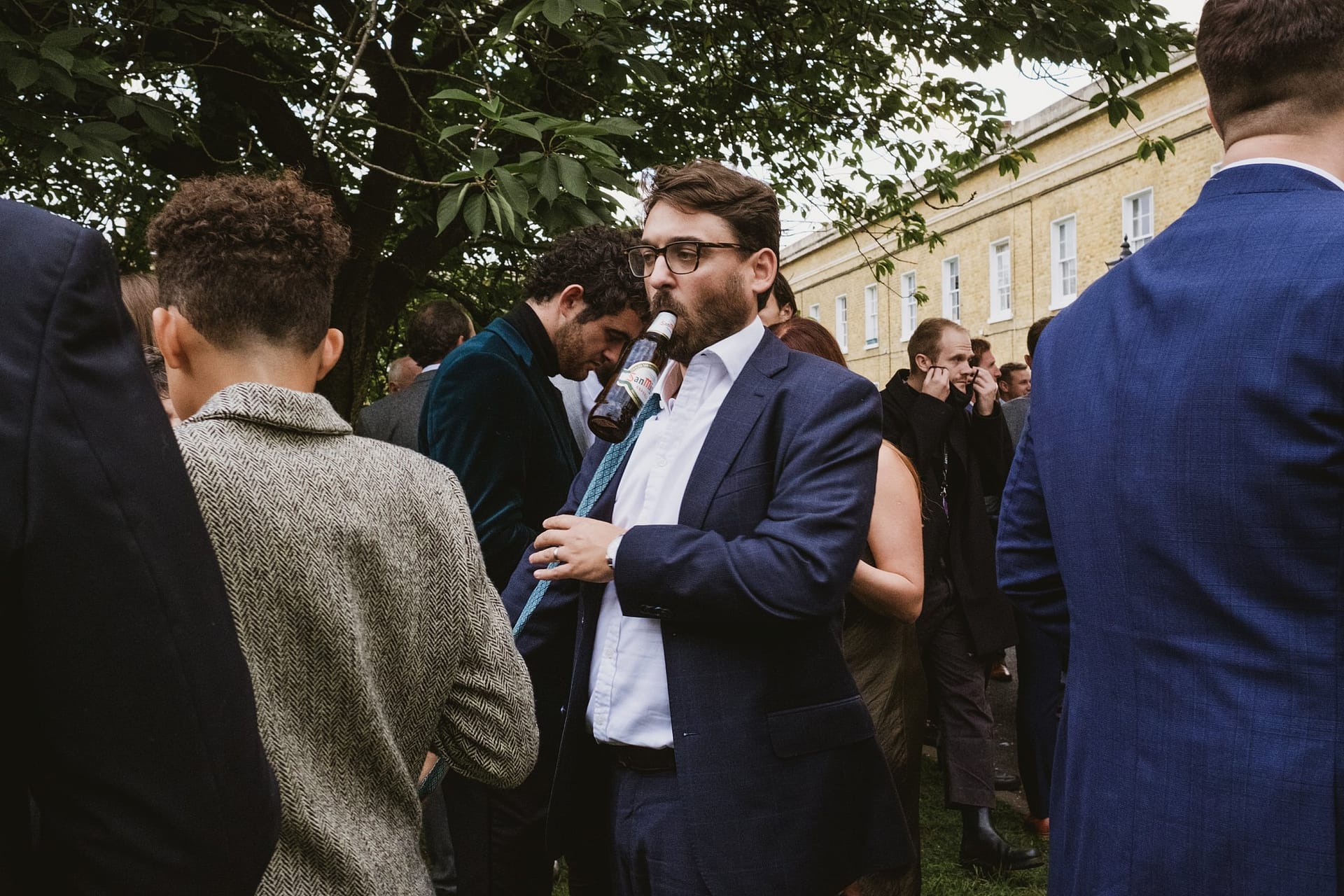 wedding guests outside the asylum chapel