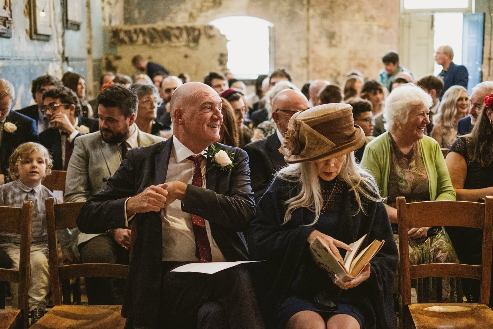 wedding guests waiting for ceremony at asylum chapel