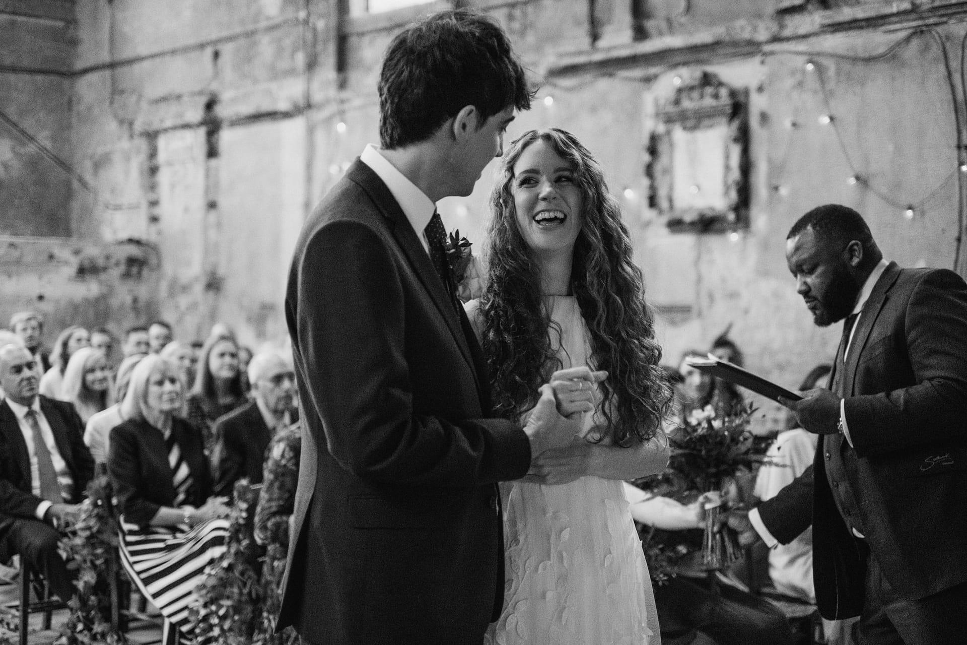 bride and groom ceremony at asylum chapel