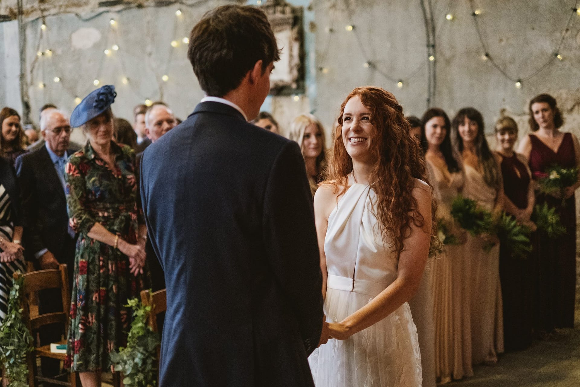 bride and groom exchanging vows at asylum chapel