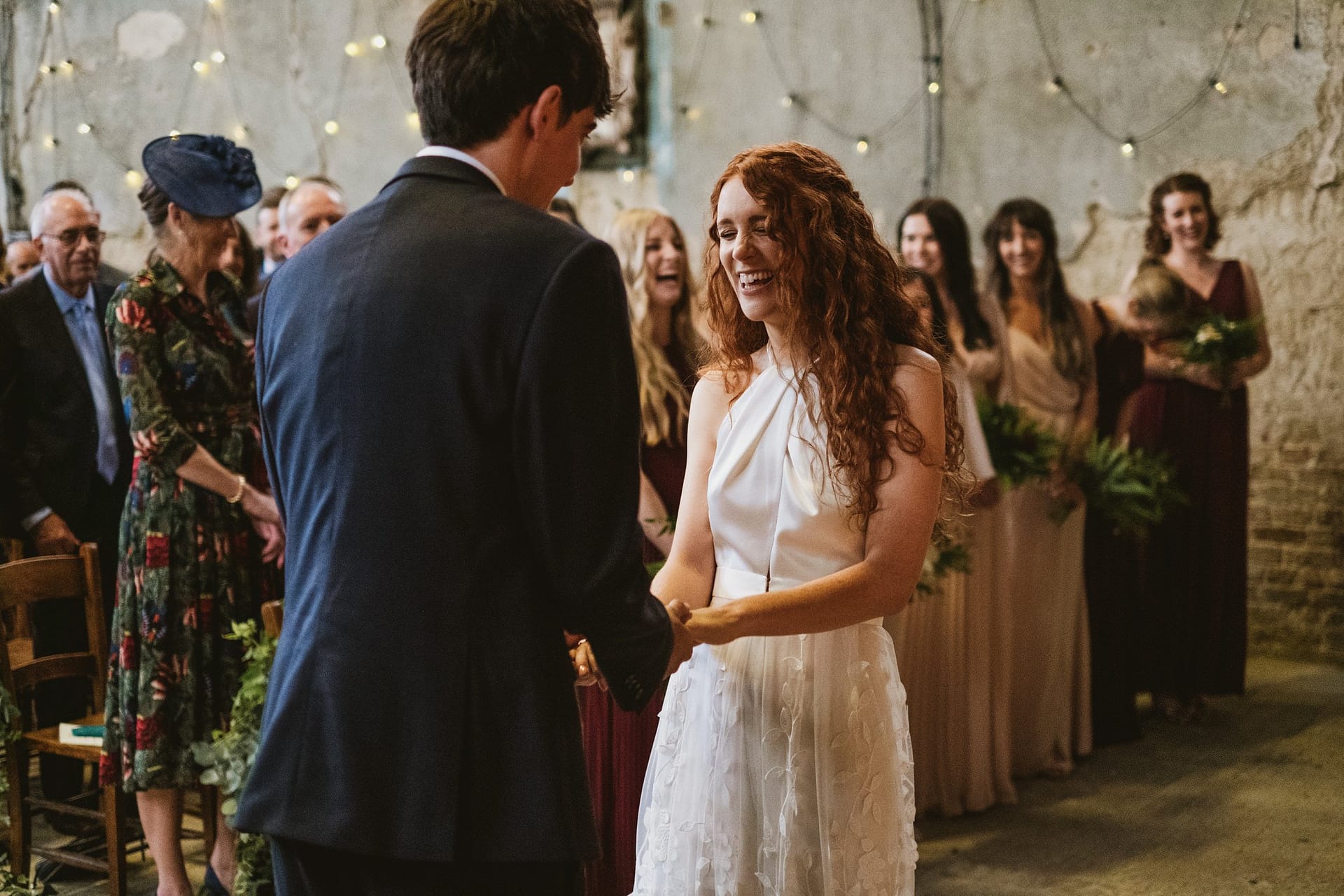 bride and groom exchanging vows at asylum chapel