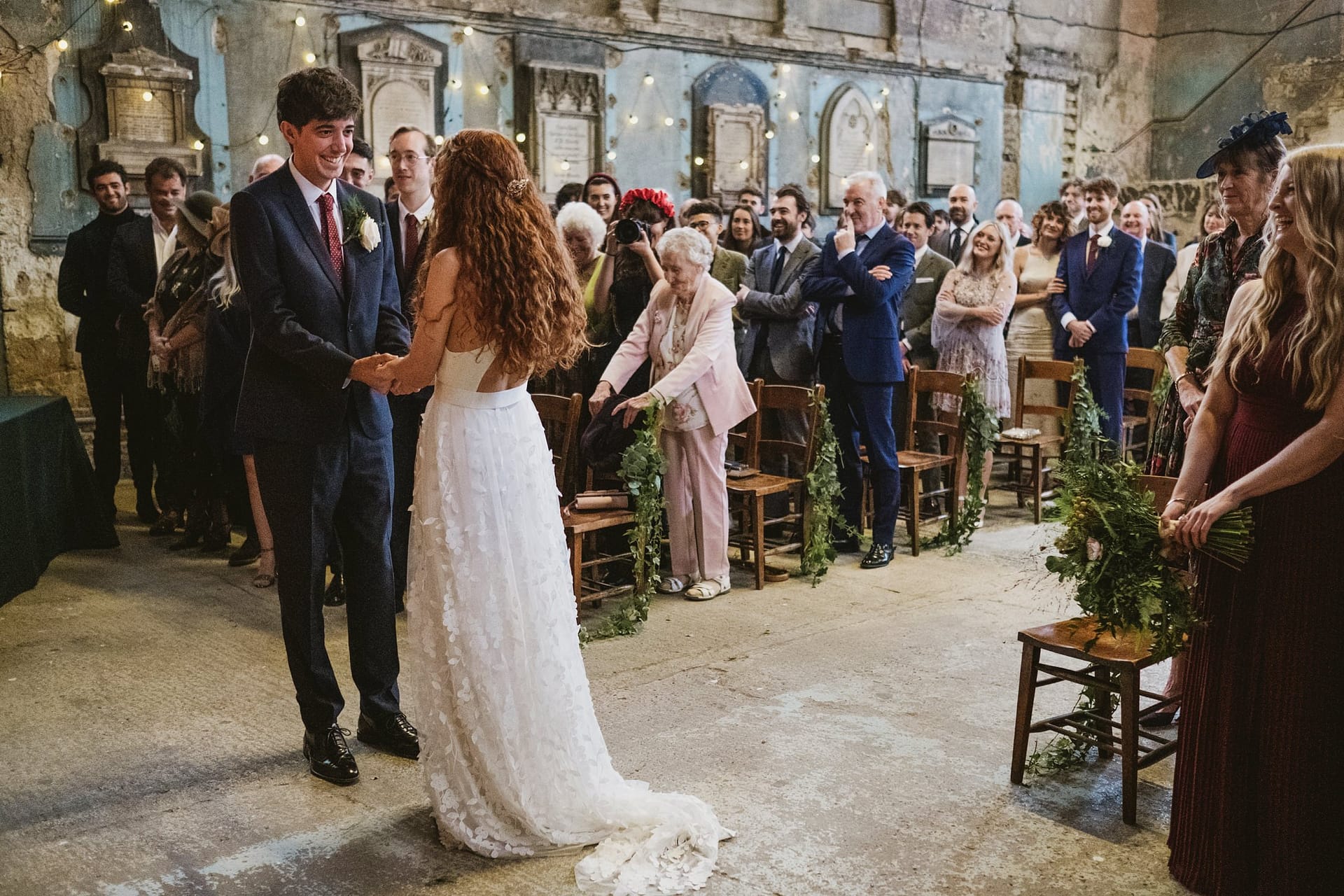 bride and groom exchanging vows at asylum chapel
