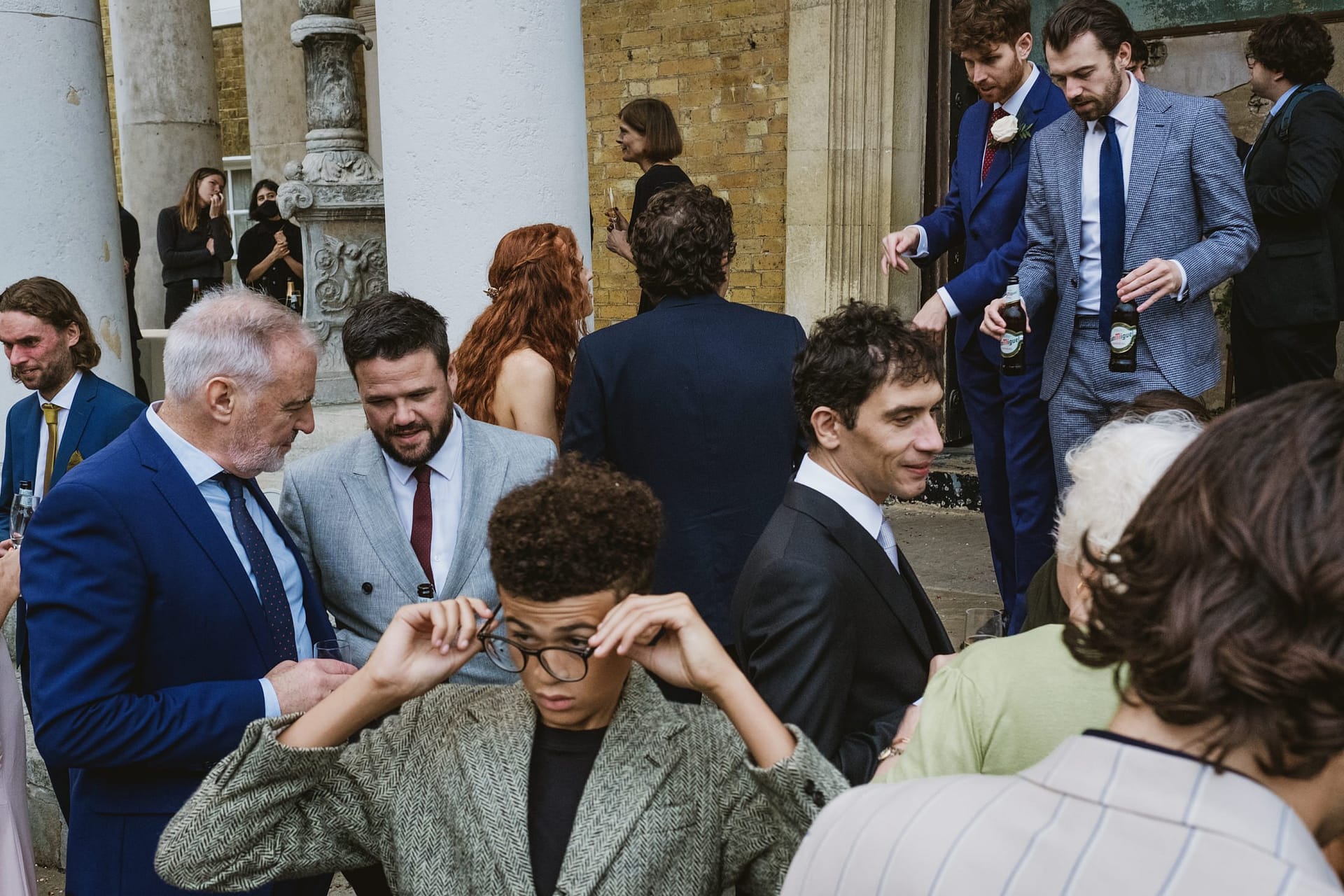 wedding guests outside the asylum chapel