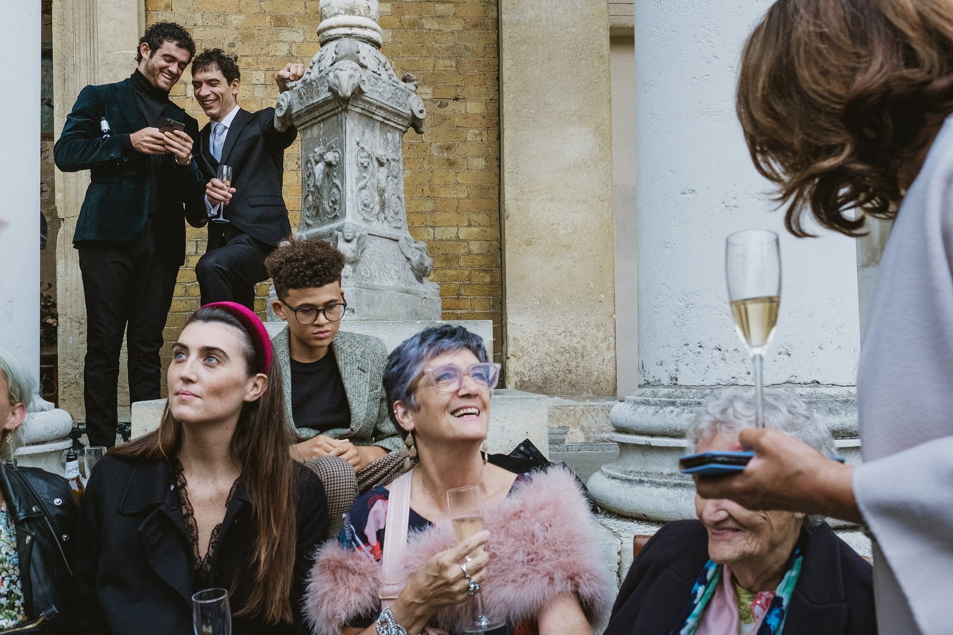 wedding guests outside the asylum chapel