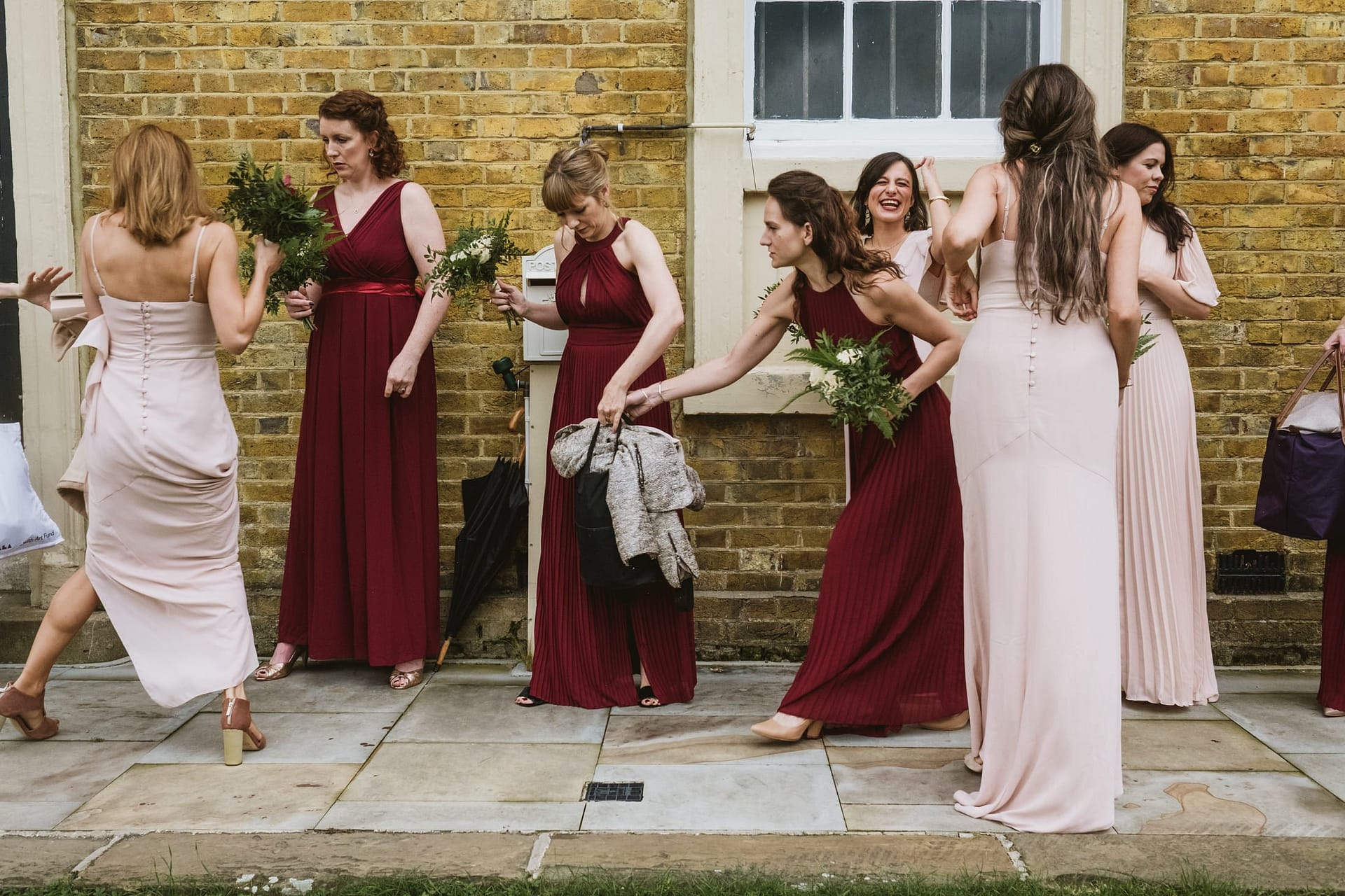 bridesmaids waiting outside the asylum chapel for the bride
