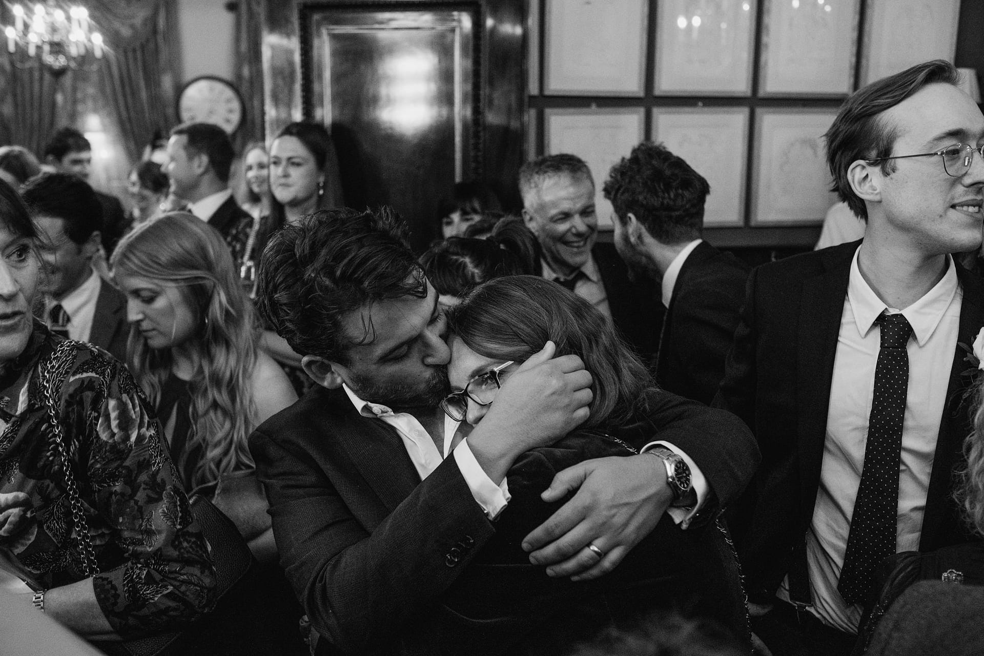 wedding guests listening to the brunswick house
