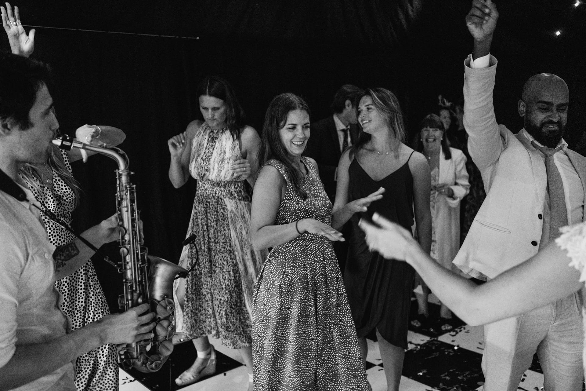 People dancing joyfully at a party.