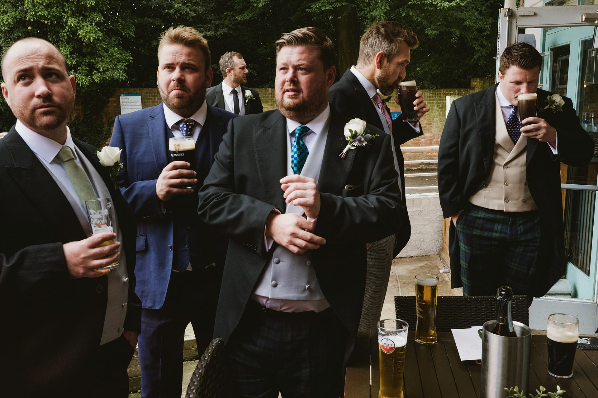 Groom and groomsmen go for a drink at the pub in Buckinghamshire