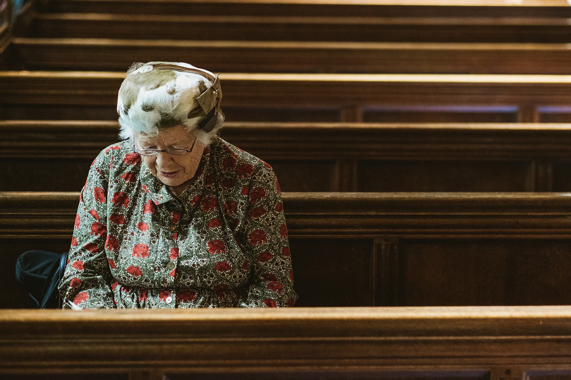 wedding guest sitting in church