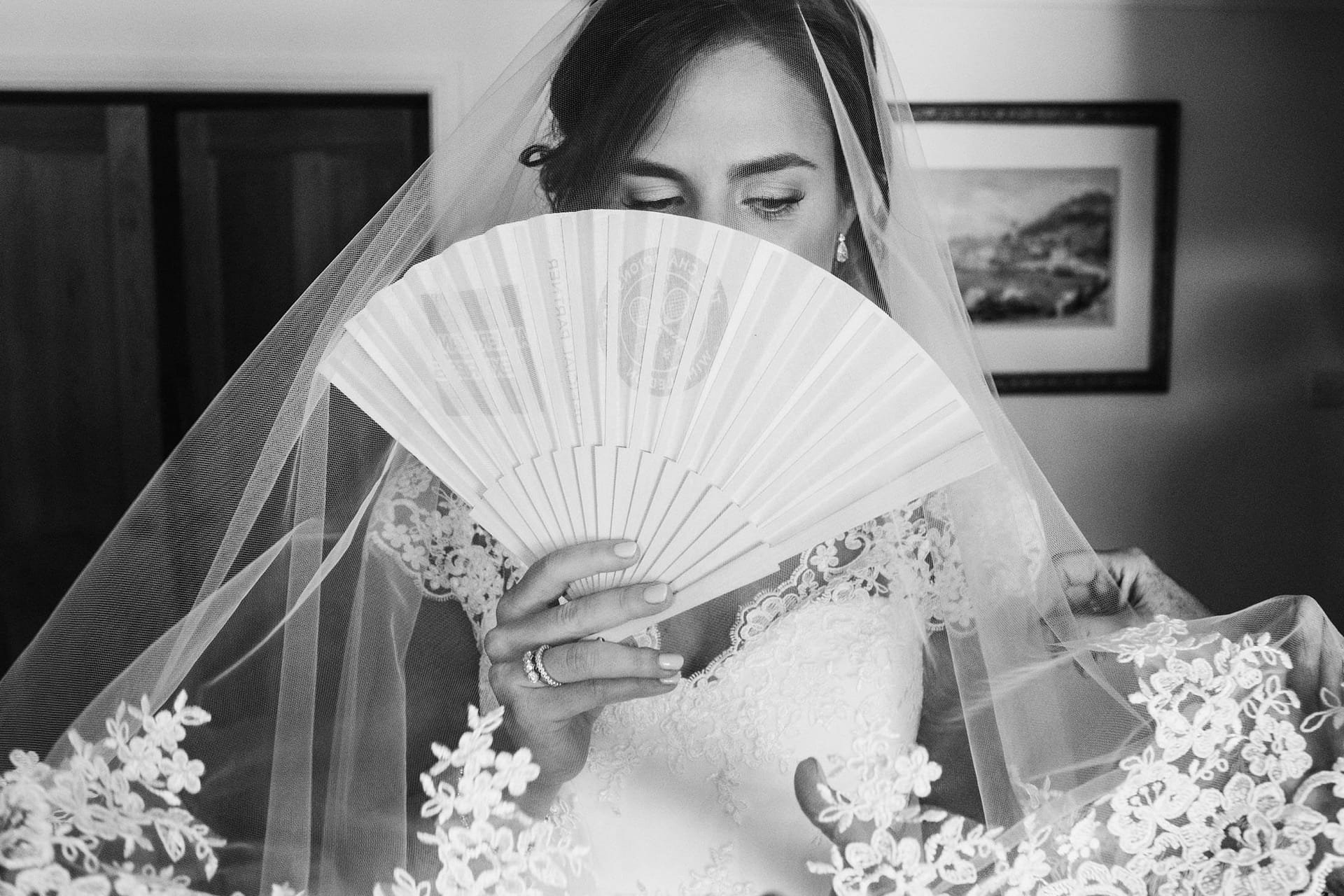 bride with fan, black and white image