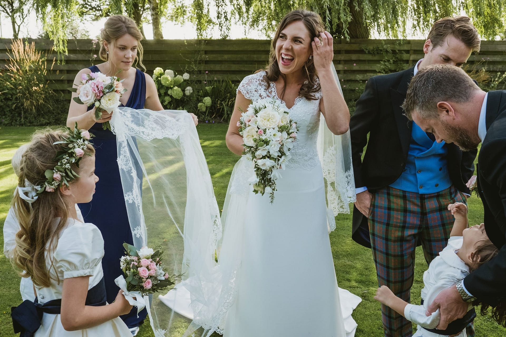bride, groom and wedding party waiting for groups