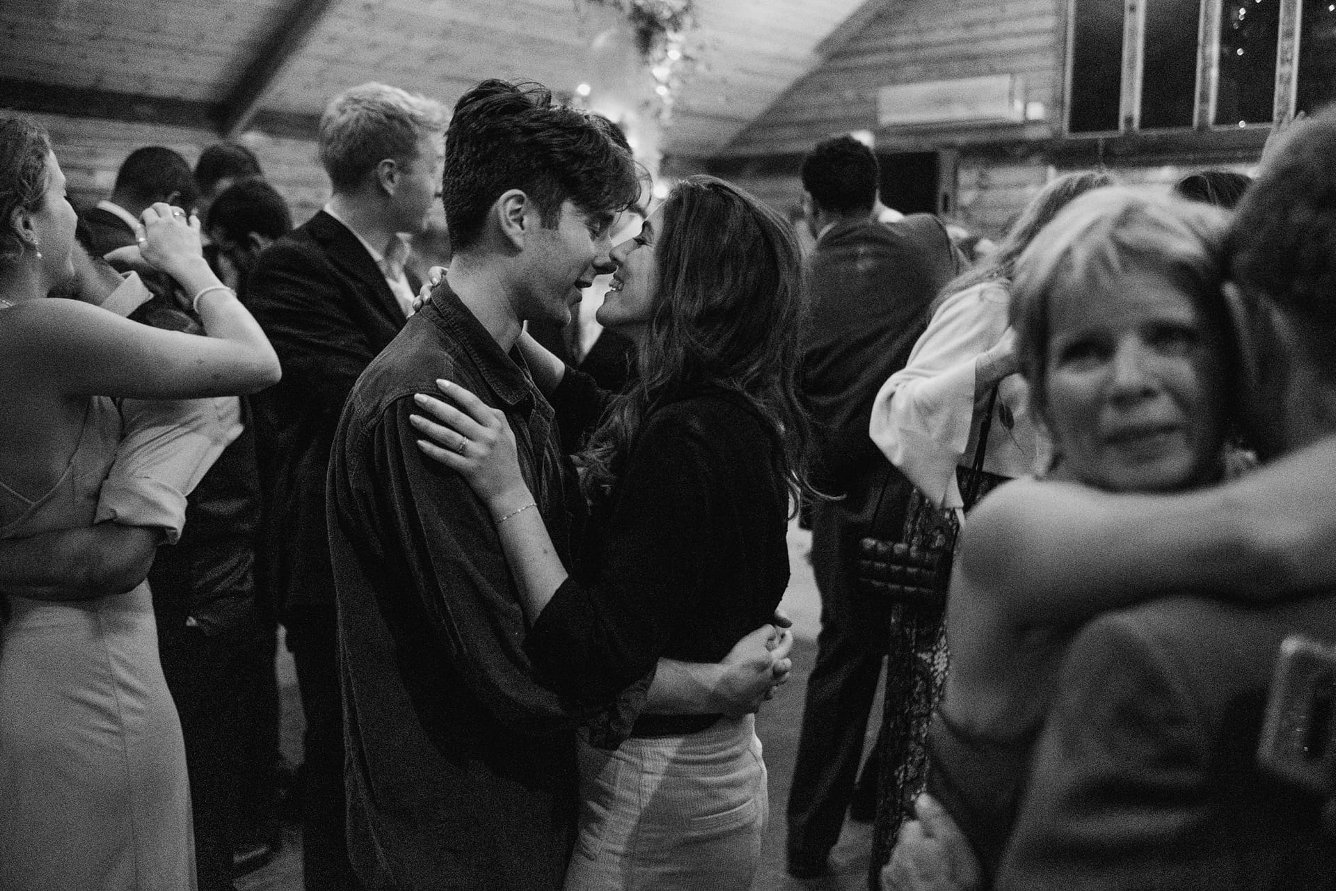 bride and groom having an intimate moment together at high billinghurst farm in surrey