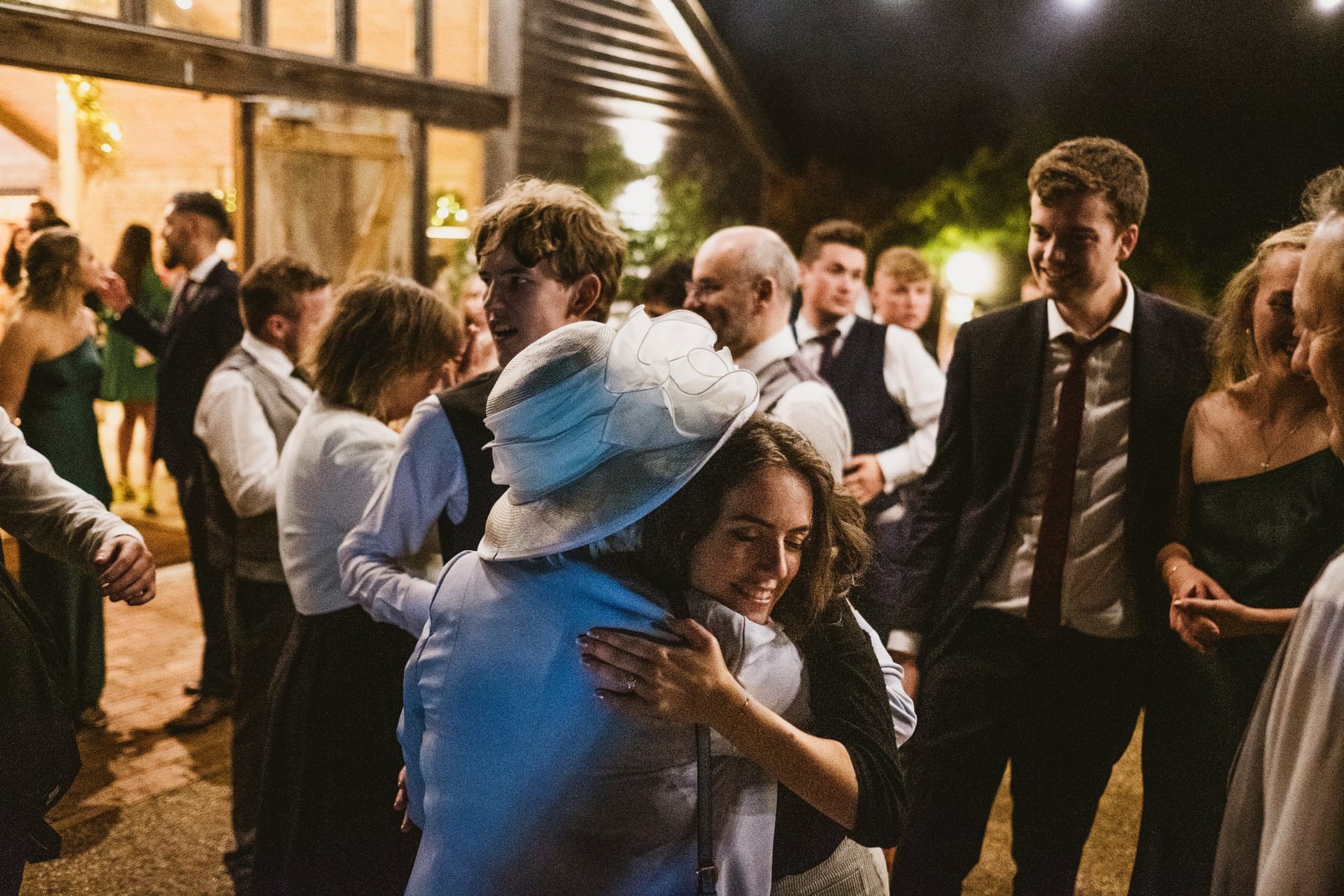 bride hugging grandma at the end of night at high billinghurst farm