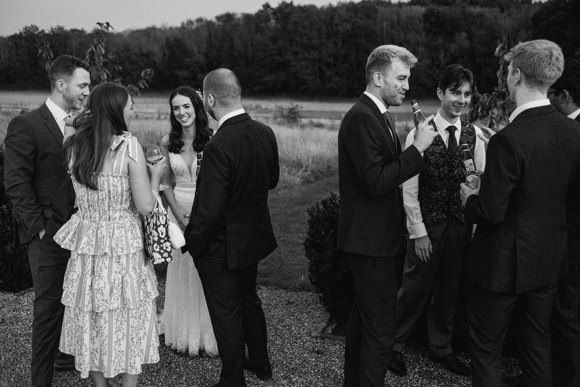 bride, groom and wedding guests at high billinghurst farm