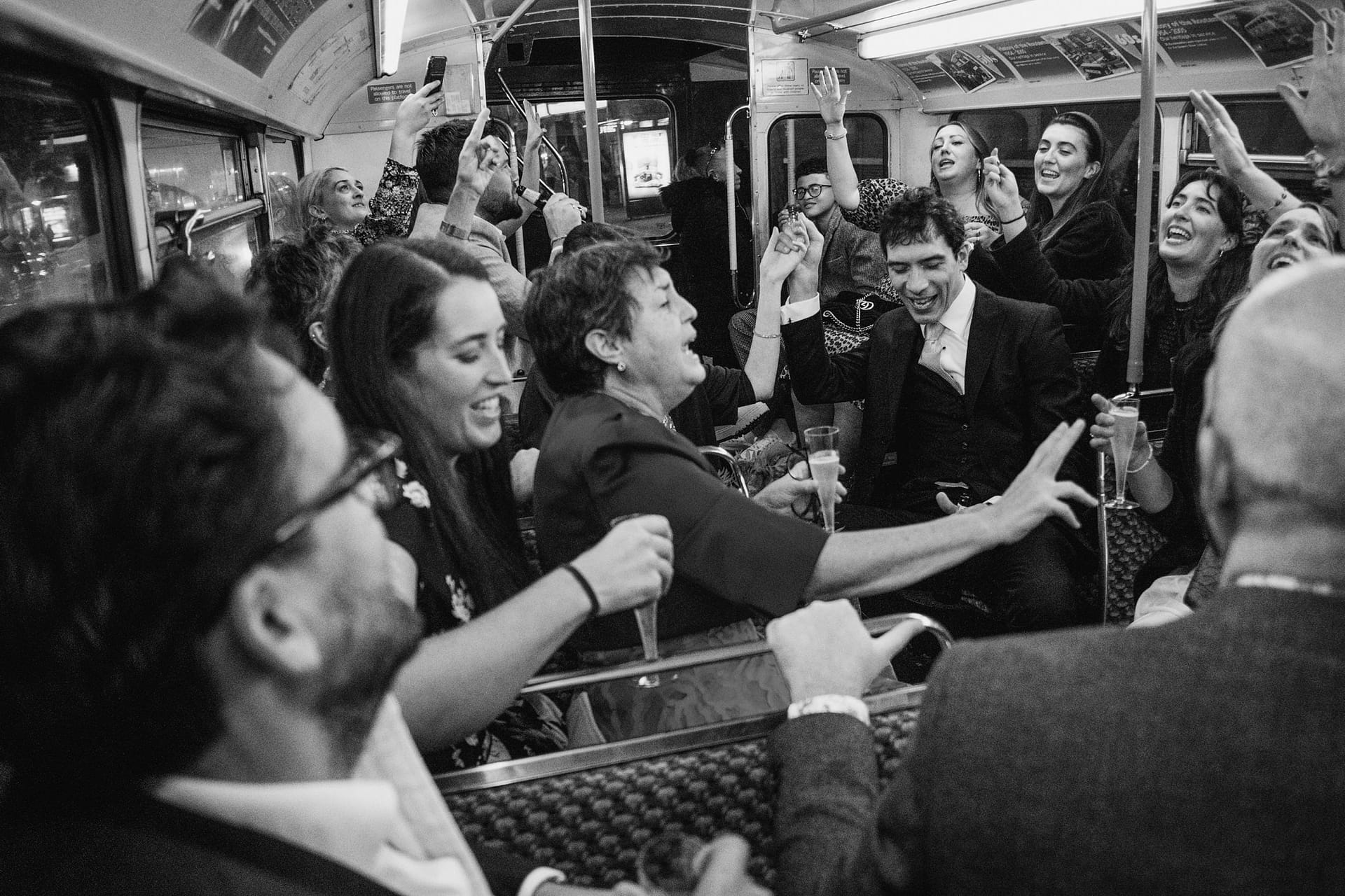 wedding guests on the london bus