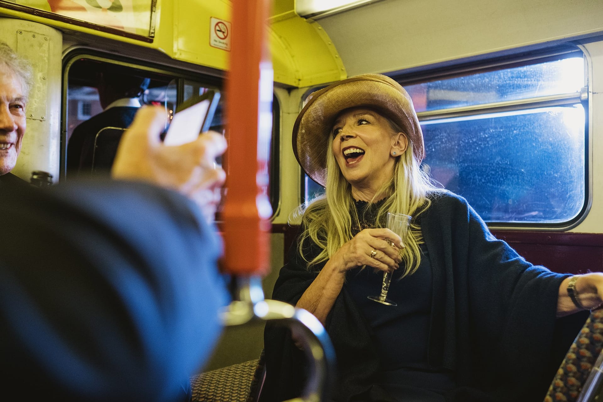 wedding guests on the london bus