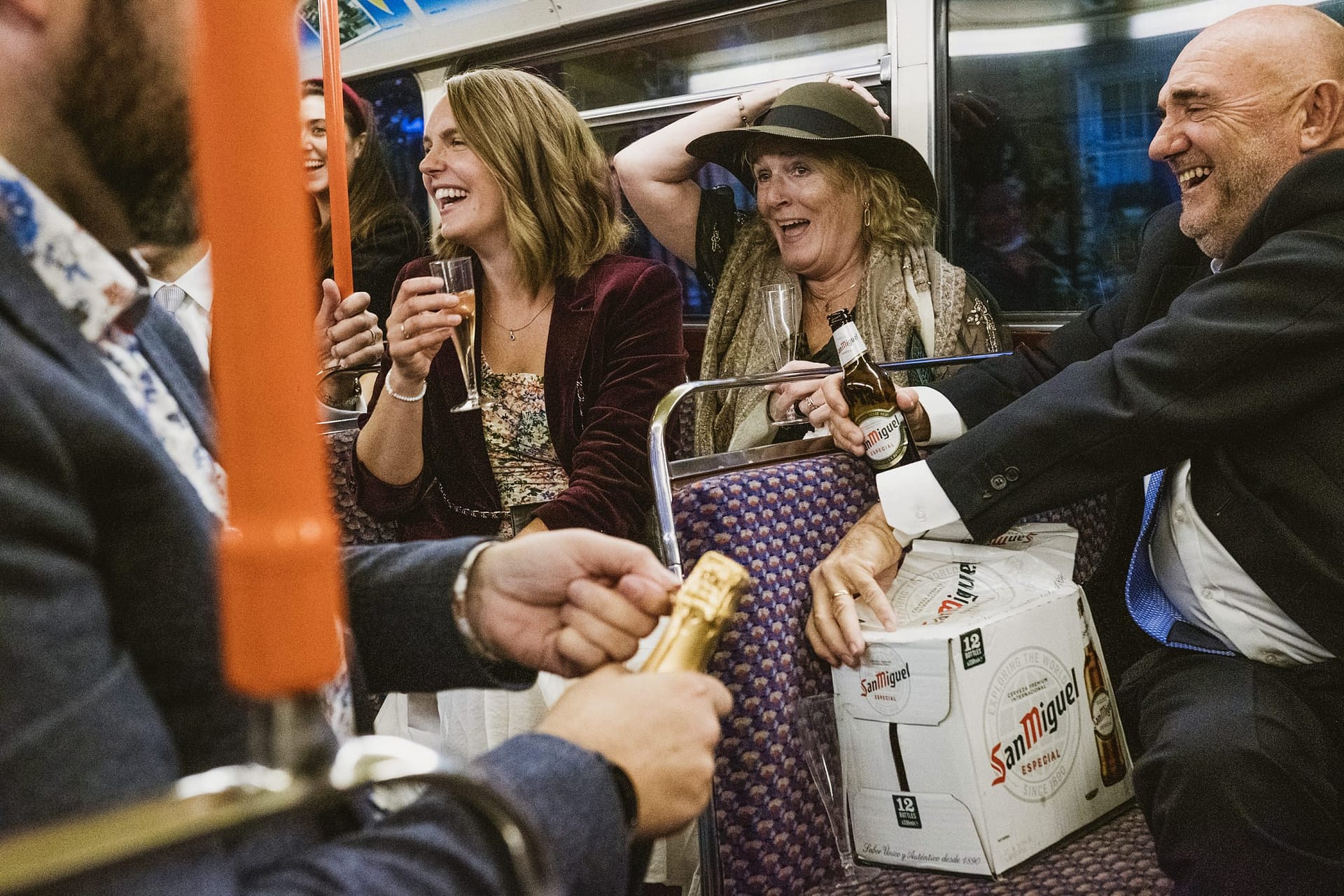wedding guests on the london bus