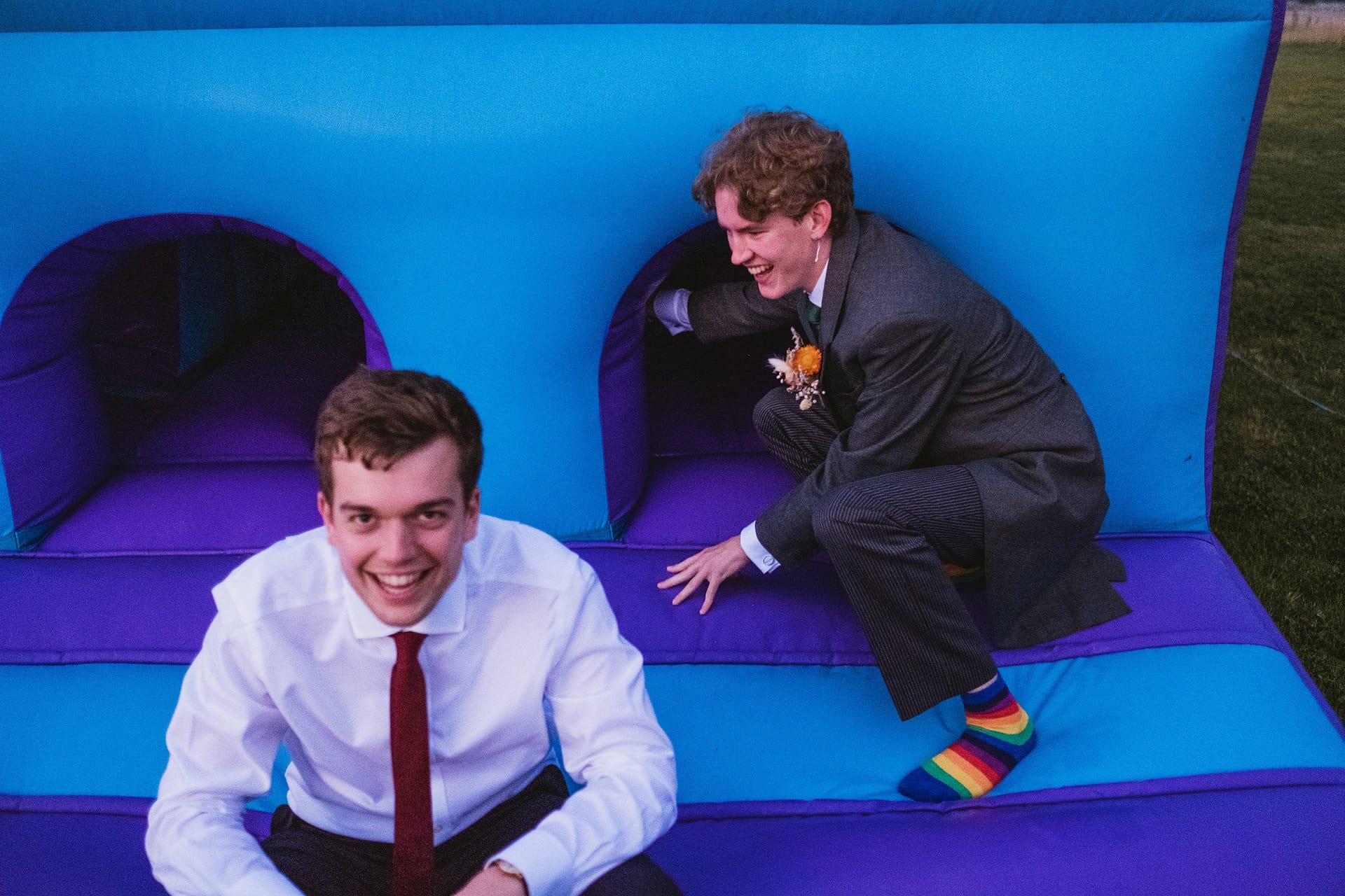 bouncy castle with wedding guests at high billinghurst farm in surrey
