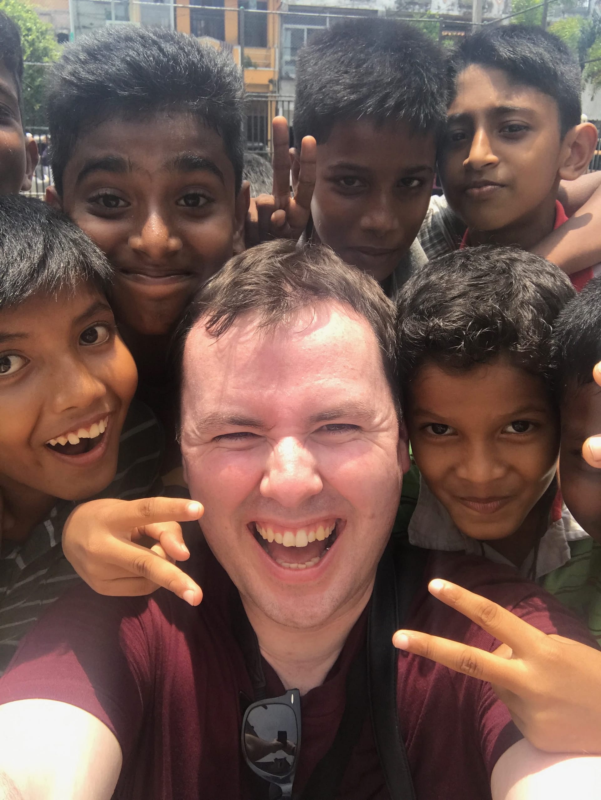 liam in cuba photographing street with the locals