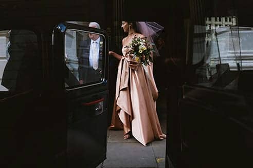 The Ned Wedding Photography London Gucci dress bride leaving for the ceremony