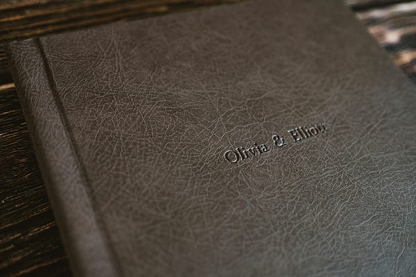 Brown, leather-bound wedding album, created by Digitalab featuring the photographs of York Place Studios