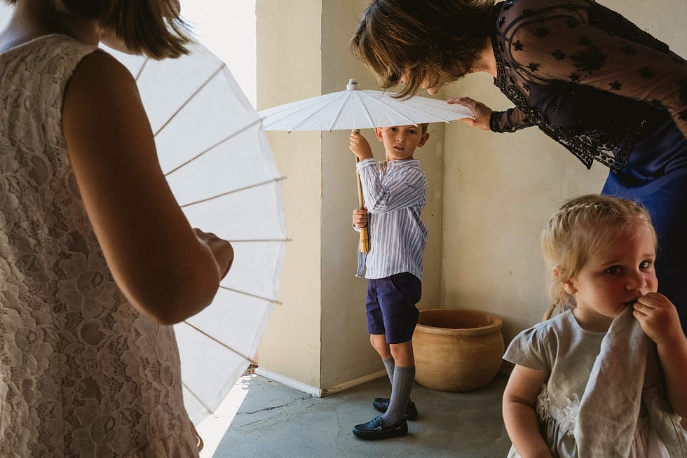 people with sun umbrellas. Wedding Photograph, Villa Love