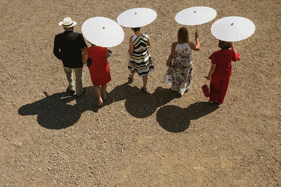 Sun Umbrellas used by guests at Krakow wedding