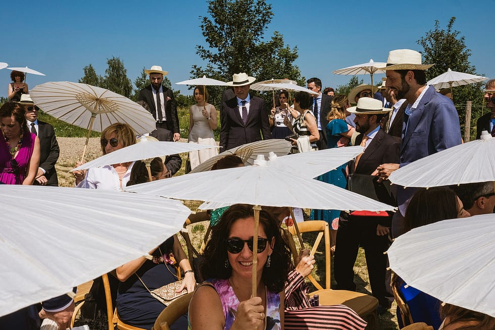 Wedding Guests with Sun Umbrellas