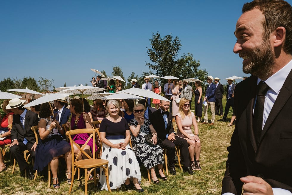 Excited groom at outdoor wedding ceremony in Krakow